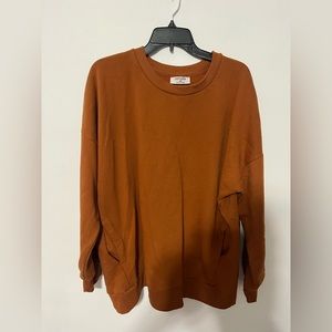 Burnt orange sweater with pockets. Size 2X. Very comfortable